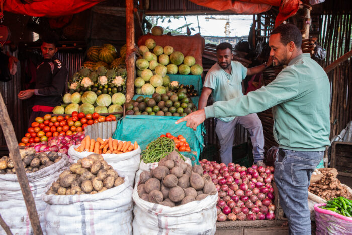 Biruk Yilma sells fruit and vegetables at the Merkato market in Addis Ababa, Ethiopia, on August 24, 2024.