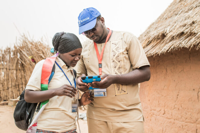 Census workers travel door to door to collect vital stats of MORDOR study participants, details are tracked on a tablet. Children between the ages of 5 and 1 are offered a height dose of azithromycin as part of the ongoing study in Bossadji, Niger on June 20, 2018.